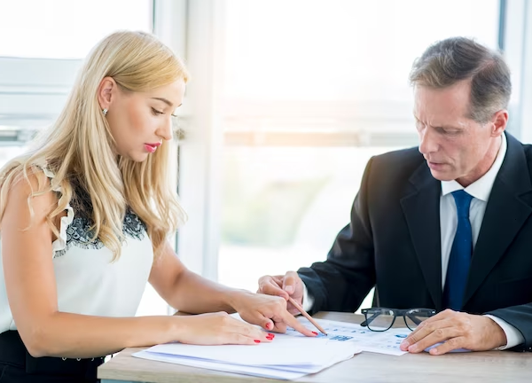 Financial advisor analyzing debt consolidation options.