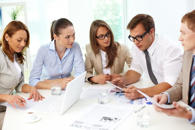 Team of professionals engaged in a finance discussion